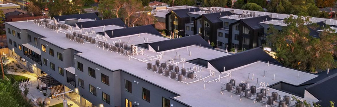 Exterior of north and south buildings at Izzy apartments.