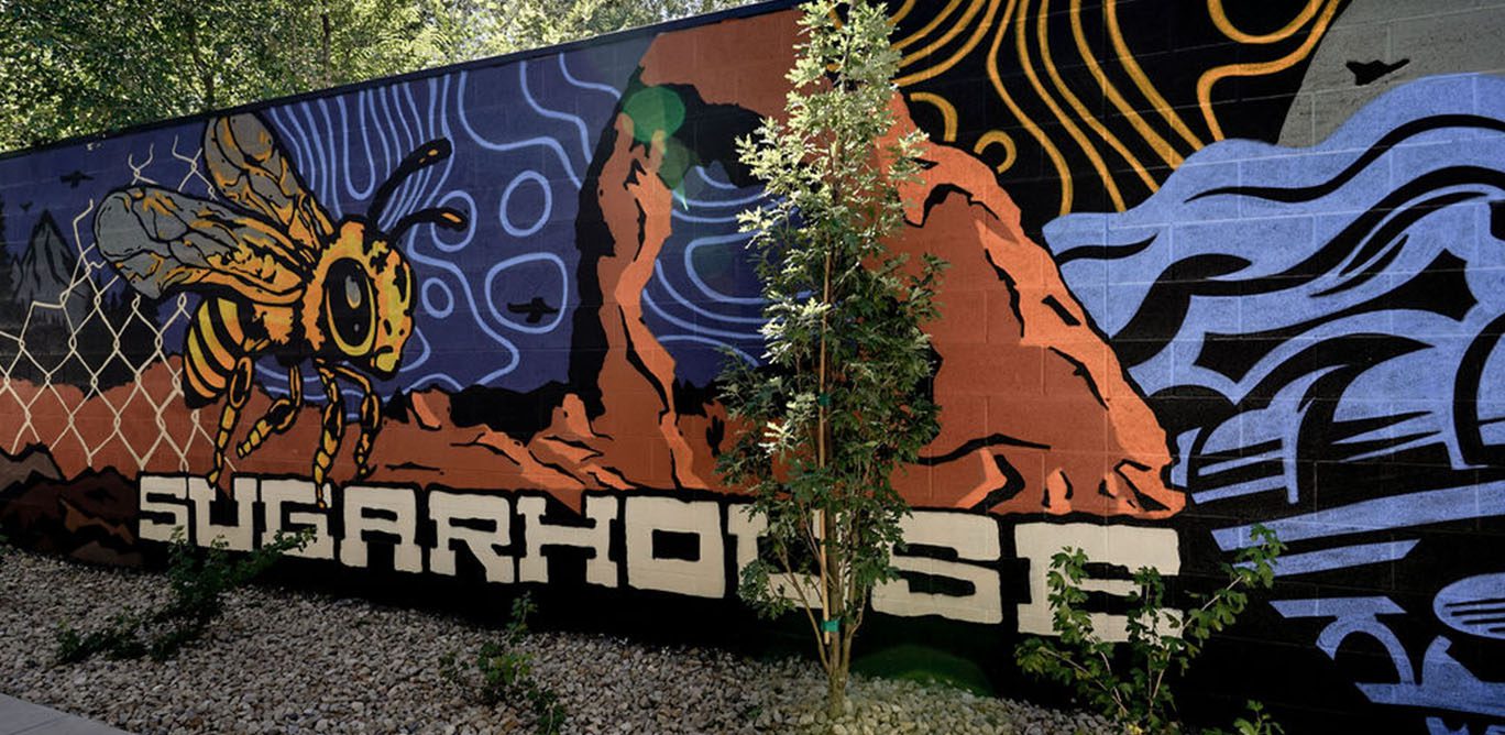 Sugarhouse mural outside of Izzy apartments.